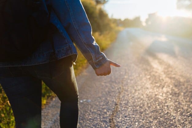 Close-up of hands clasped together in prayer over a travel map, symbolizing a heartfelt prayer for safe travel and divine protection during a journey.