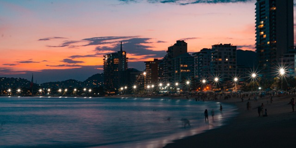 "Acapulco de Juárez – A sunset skyline in dangerous cities in Mexico."