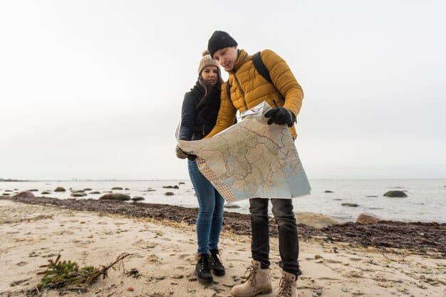 Hands clasped in prayer over a travel map, symbolizing a prayer for safe travel and divine protection during journeys.